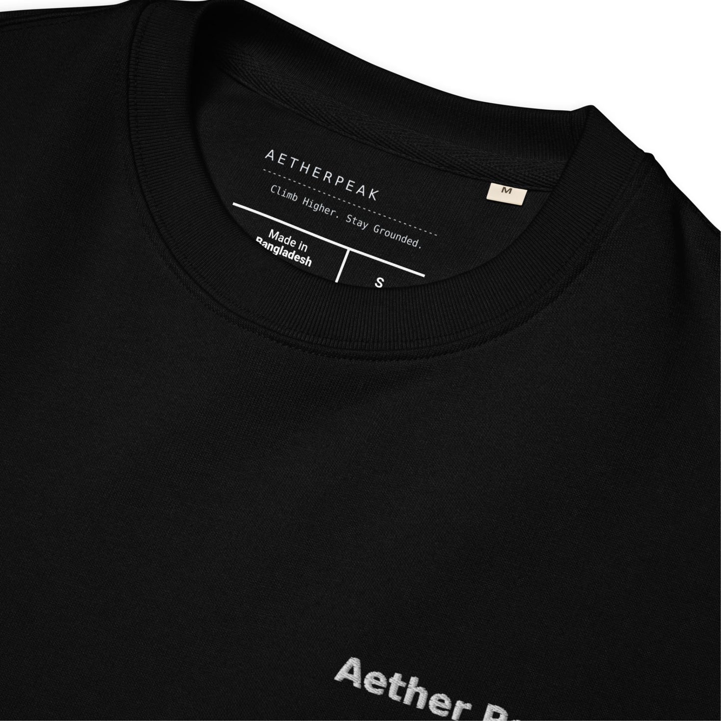 Black t-shirt with 'Aetherpeak' branding on a white background