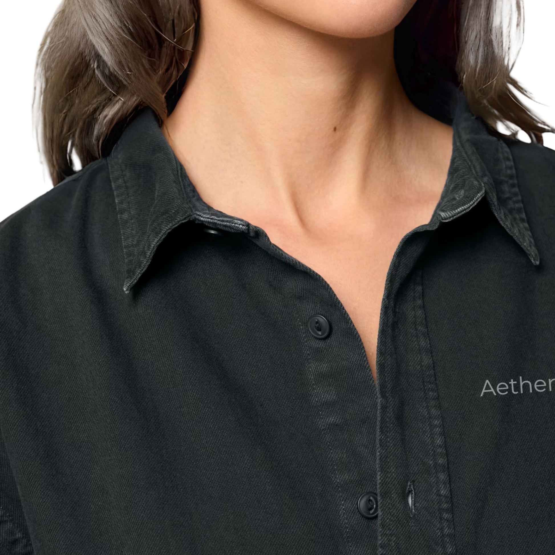 Close-up of a person wearing a black overshirt with 'Aether Peak' branding.