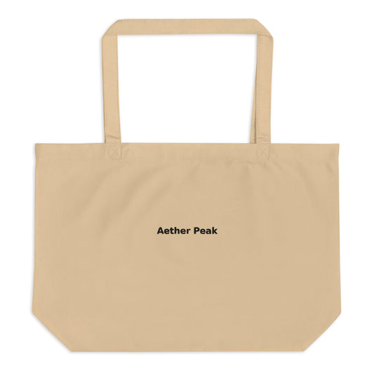 Desert Dust organic cotton tote bag with 'Aether Peak' text on a white background